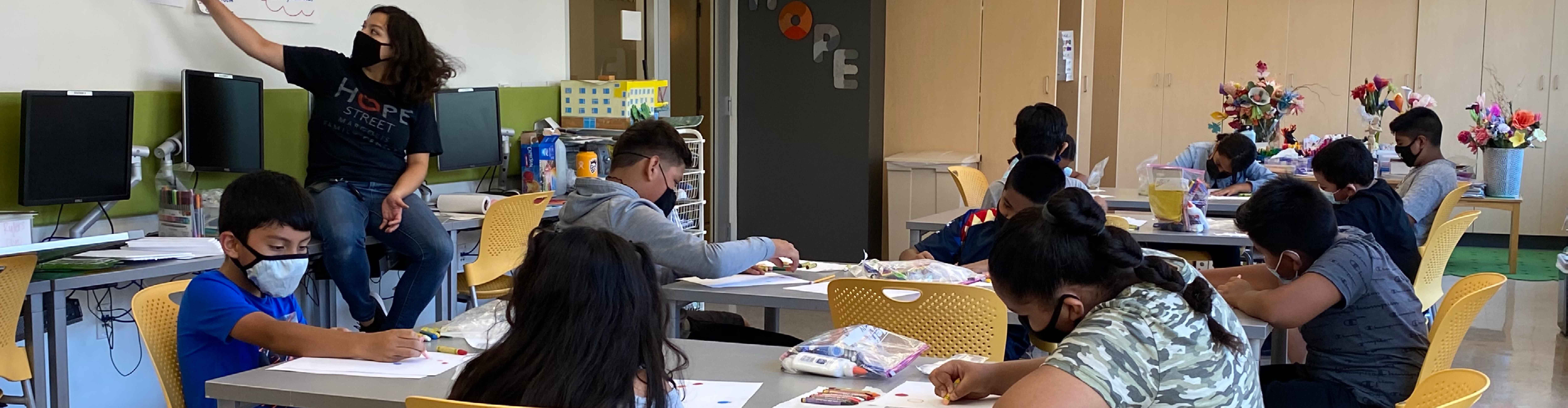 Children and teacher in a classroom